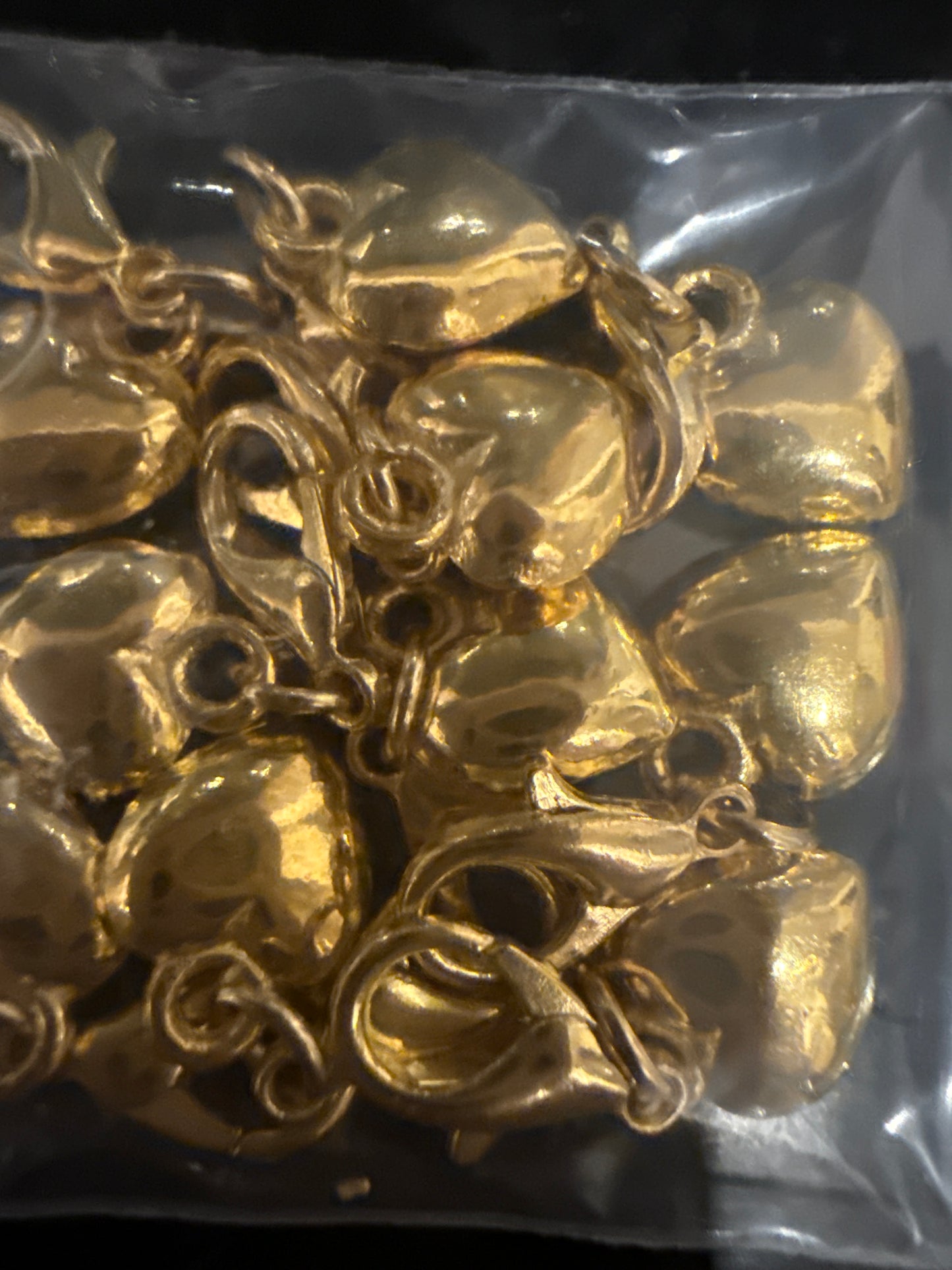 Gold heart charm
